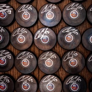 New York Islander Fan Favorite Casey Cizikas Autographed New York Islander Logo Puck Beckett